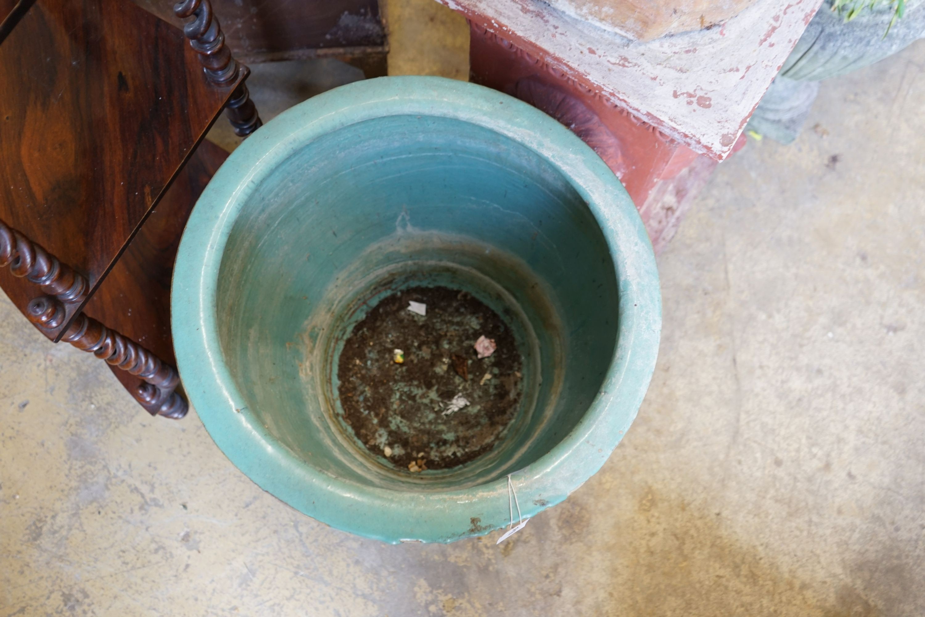 A circular Chinese style glazed earthenware garden planter, diameter 50cm height 50cm.